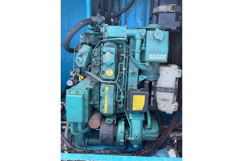 Slide: The Image of Vintage Volvo Penta engine in a 1976 Wilson model 24 boat. - 9