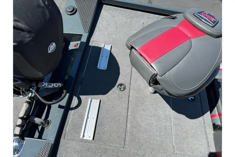 Slide: The Image of 2024 Ranger RT178 boat interior with red and gray seating, showcasing deck and motor area. - 12
