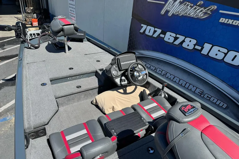 Slide: The Image of 2024 Ranger RT178 boat interior with steering console and seating. - 13