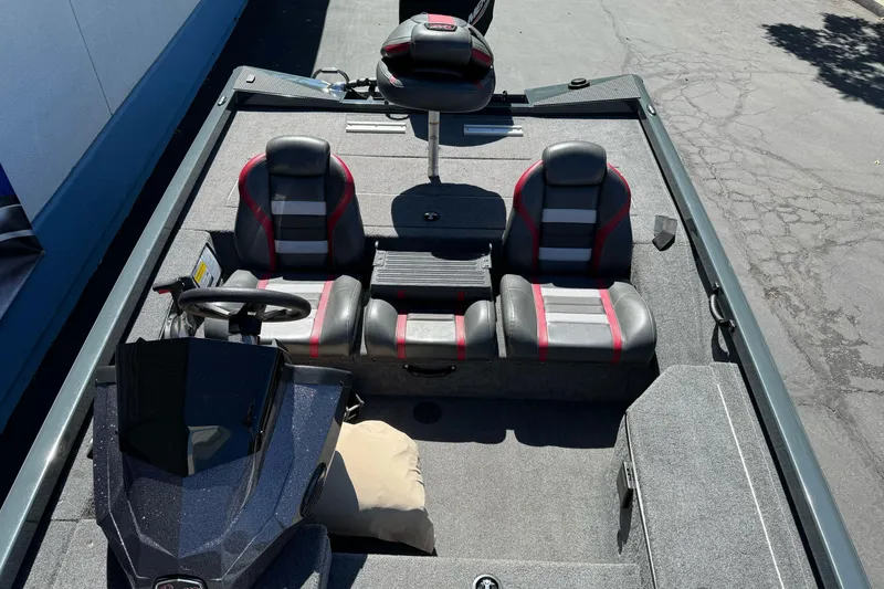 Slide: The Image of 2024 Ranger RT178 boat interior with three seats and steering console. - 16