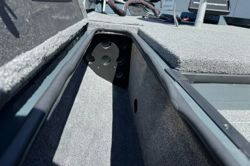 Slide: The Image of 2024 Ranger RT178 boat interior storage compartment with carpeted finish. - 20