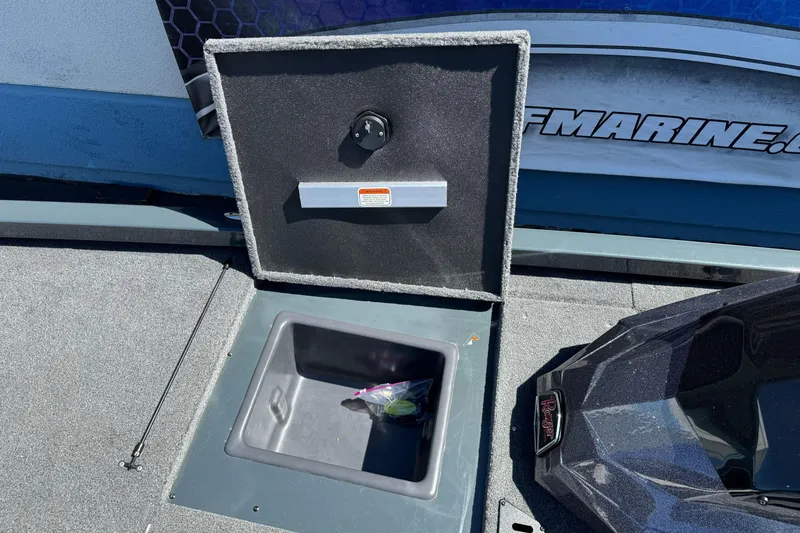 Slide: The Image of Open storage compartment on 2024 Ranger RT178 boat deck. - 21