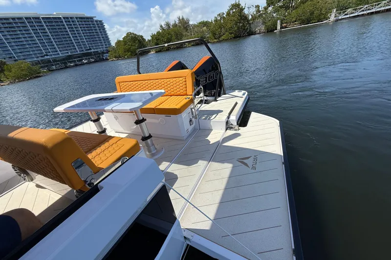 Slide: The Image of Luxury 2026 VIRTUE YACHTS V10 TOP on water, featuring stylish seating and modern design. - 6