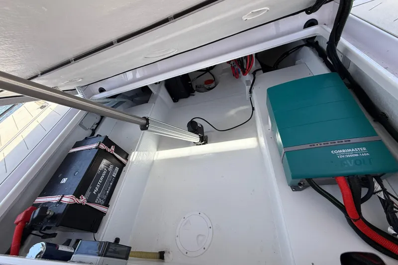 Slide: The Image of Interior view of 2026 VIRTUE YACHTS V10 TOP, showcasing battery and electrical components. - 8