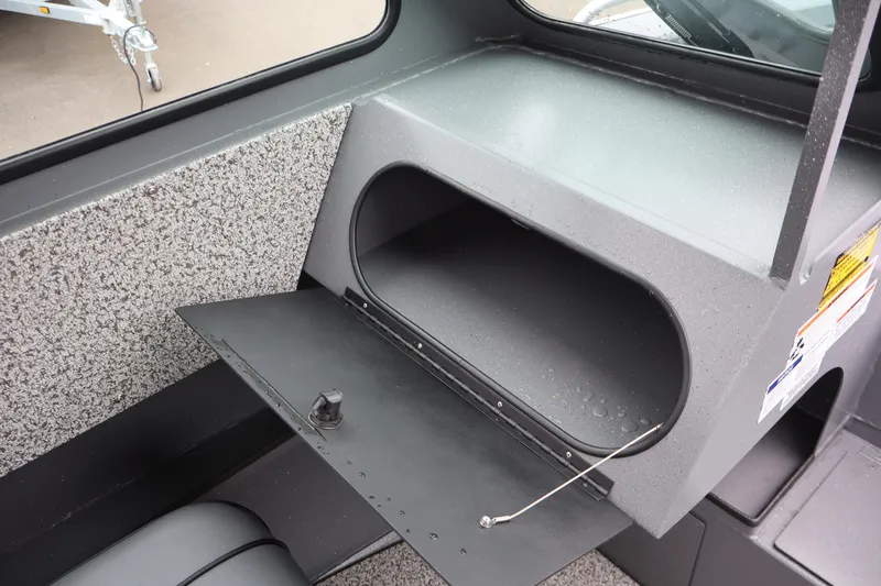 Slide: The Image of 2026 Alumaweld Stryker X202 boat interior storage compartment detail. - 15