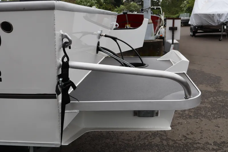 Slide: The Image of 2026 Alumaweld Stryker X202 boat stern with railing and cables. - 18