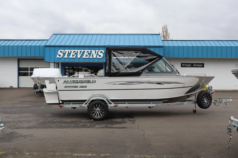 Slide: The Image of 2026 Alumaweld Stryker X202 boat on trailer outside Stevens dealership. - 3