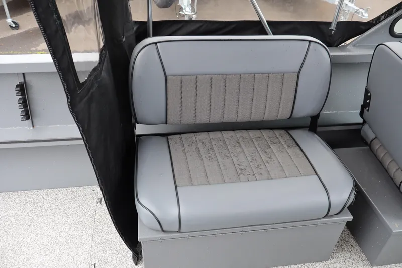 Slide: The Image of 2026 Alumaweld Talon 18 boat seat with gray upholstery and black trim. - 10