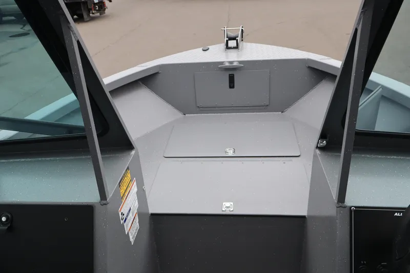 Slide: The Image of 2026 Alumaweld Talon 18 boat interior, featuring a sleek, modern design with ample storage. - 15