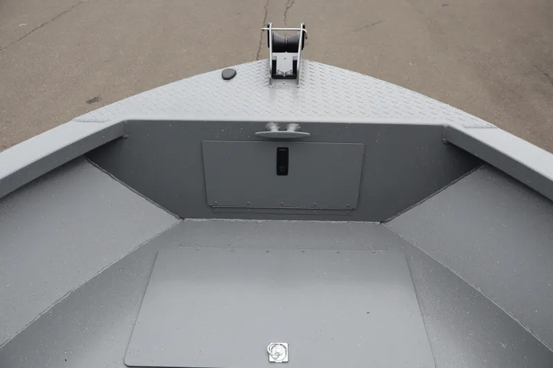 Slide: The Image of 2026 Alumaweld Talon 18 boat bow with storage compartment and anchor mount. - 16