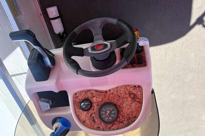 Slide: The Image of Steering console of a 2011 Sun Tracker Bass Buggy 18 Classic Series boat. - 8