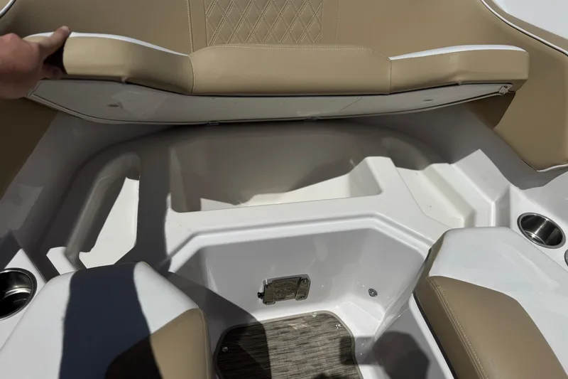 Slide: The Image of Interior seating of 2017 Scarab 255 H.O. Platinum boat with beige upholstery. - 15