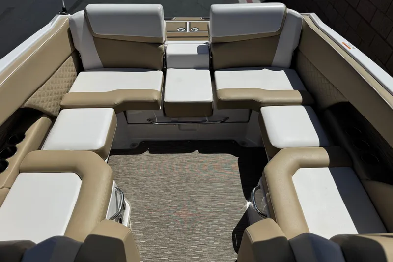 Slide: The Image of Interior seating of 2017 Scarab 255 H.O. Platinum boat, featuring beige and white upholstery. - 20
