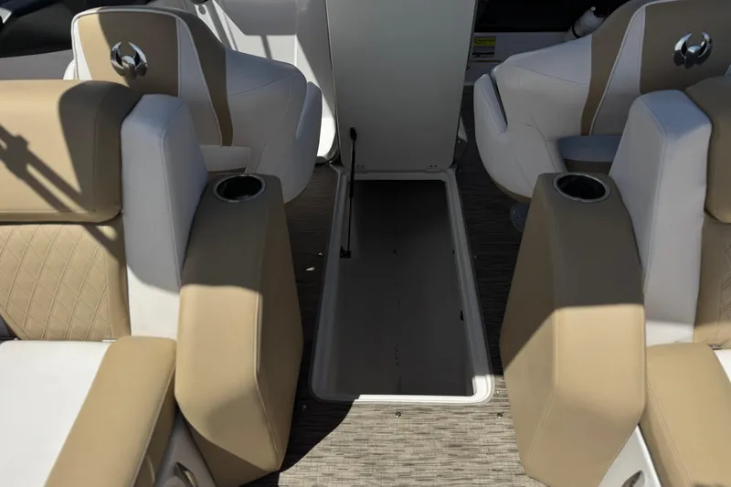 Slide: The Image of Interior of 2017 Scarab 255 H.O. Platinum boat with beige and white seating. - 26