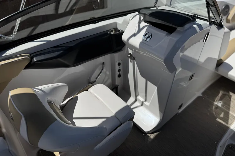 Slide: The Image of 2017 Scarab 255 H.O. Platinum boat interior with sleek helm and comfortable seating. - 27