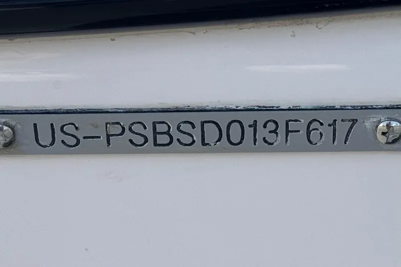 Slide: The Image of 2017 Scarab 255 H.O. Platinum boat hull identification number plate. - 38