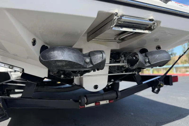 Slide: The Image of 2017 Scarab 255 H.O. Platinum boat underside with trailer, showcasing propulsion system. - 9