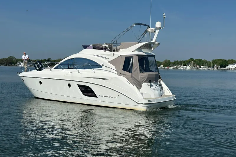 Slide: The Image of 2011 Beneteau Monte Carlo 47 Fly yacht cruising on calm waters. - 8