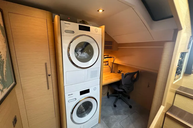 Slide: The Image of Laundry and workspace area inside 2011 Beneteau Monte Carlo 47 Fly yacht. - 27
