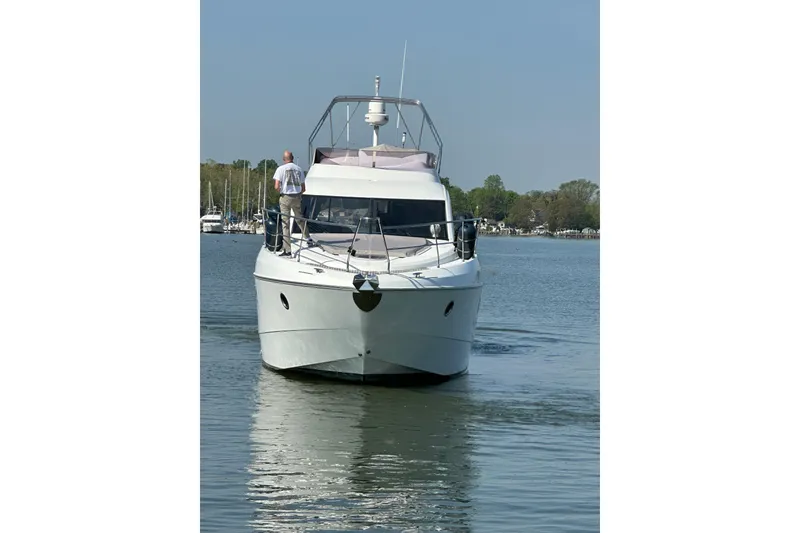 Slide: The Image of 2011 Beneteau Monte Carlo 47 Fly yacht cruising on calm waters. - 10