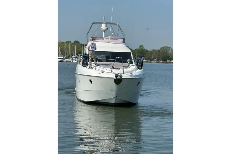 Slide: The Image of 2011 Beneteau Monte Carlo 47 Fly yacht cruising on calm waters. - 12