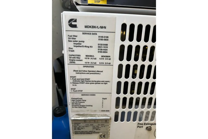 Slide: The Image of Cummins engine service data label on 2011 Beneteau Monte Carlo 47 Fly yacht. - 47
