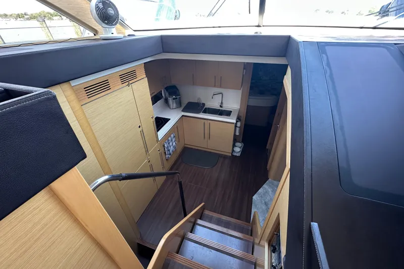 Slide: The Image of Interior view of 2011 Beneteau Monte Carlo 47 Fly yacht kitchen area. - 26