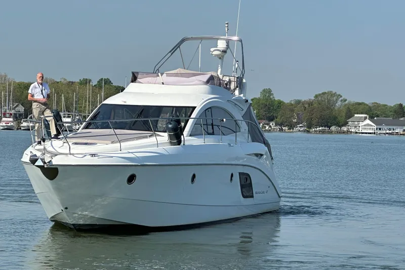Slide: The Image of 2011 Beneteau Monte Carlo 47 Fly yacht cruising on calm waters. - 11