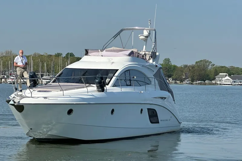 Slide: The Image of 2011 Beneteau Monte Carlo 47 Fly yacht cruising on a calm lake. - 5