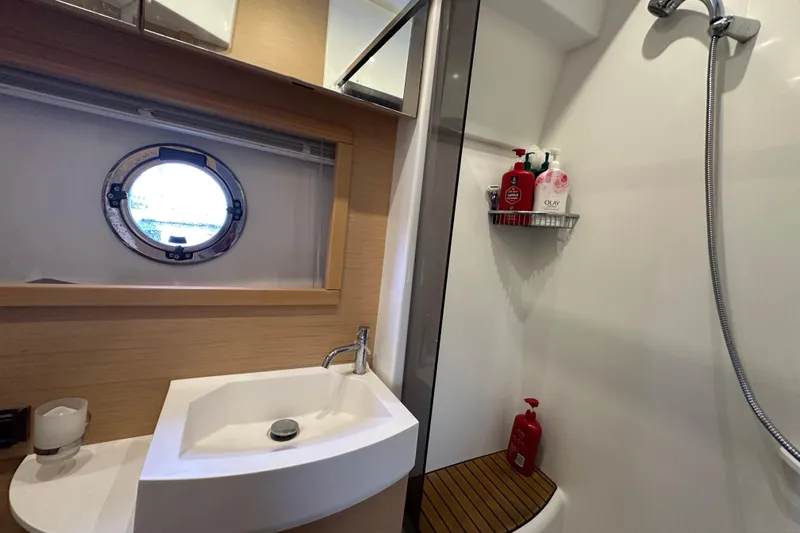 Slide: The Image of Bathroom interior of 2011 Beneteau Monte Carlo 47 Fly yacht with porthole and shower. - 45