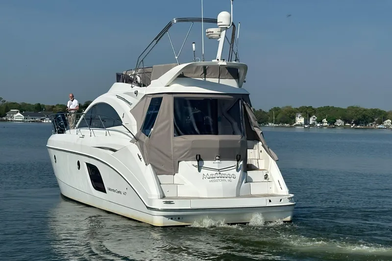 Slide: The Image of 2011 Beneteau Monte Carlo 47 Fly yacht cruising on a calm lake. - 4
