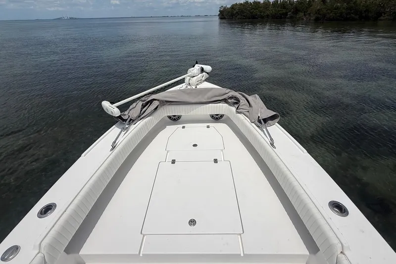 Slide: The Image of Bow view of 2016 Dorado 25 SE boat on calm water. - 19