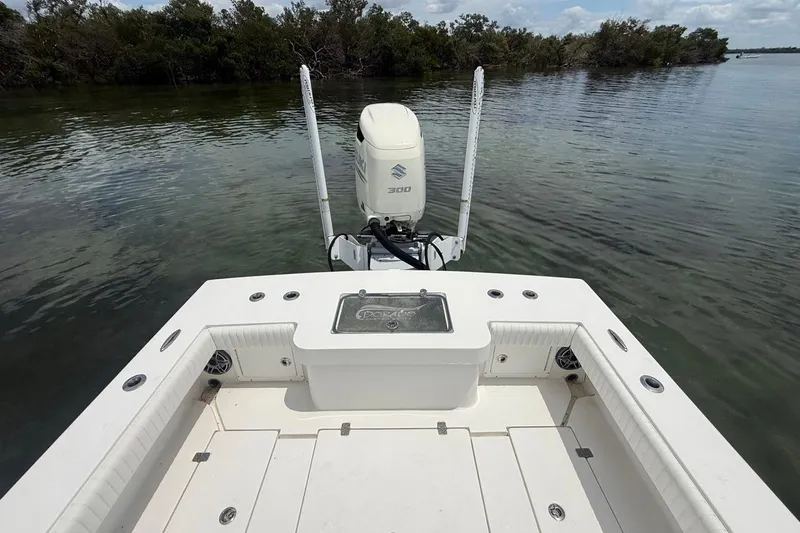 Slide: The Image of 2016 Dorado 25 SE boat with Suzuki 300 engine on calm water. - 26