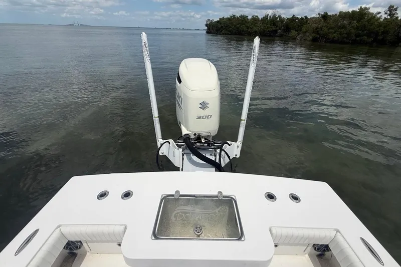 Slide: The Image of 2016 Dorado 25 SE boat with Suzuki 300 engine on calm water. - 27