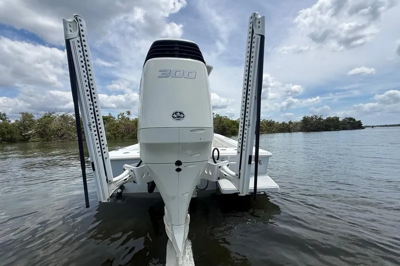 Slide: The Image of 2016 Dorado 25 SE boat with powerful outboard motor on calm water. - 8