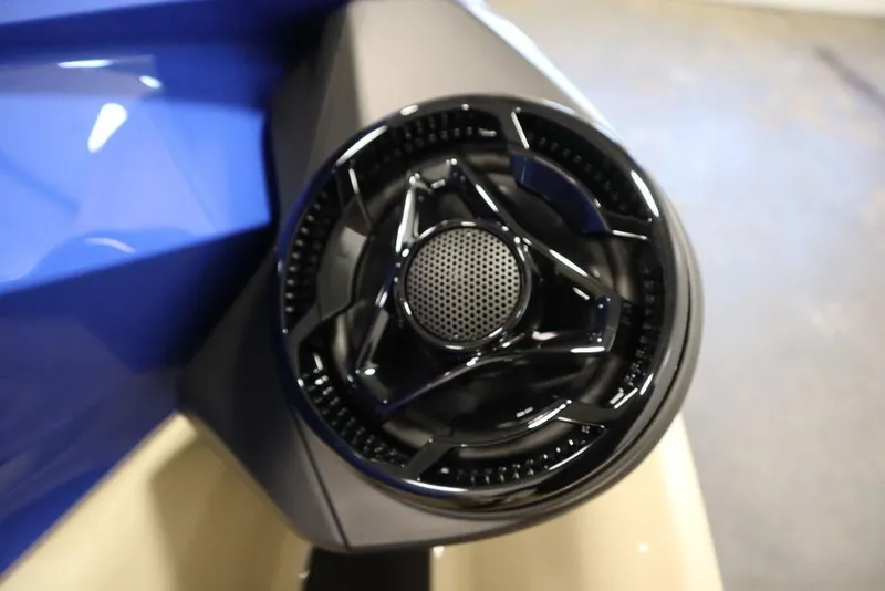 Slide: The Image of Close-up of 2025 Sea-Doo Wake Pro 230 speaker detail, featuring sleek black design. - 17