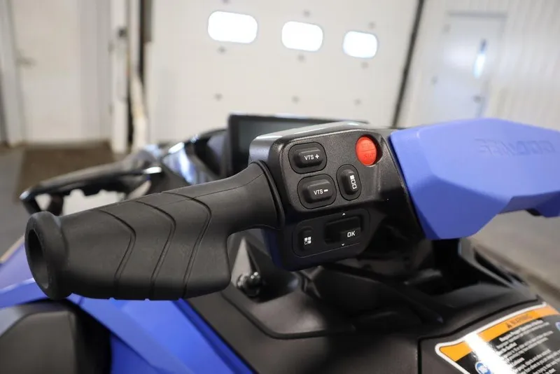 Slide: The Image of Handlebar controls of 2025 Sea-Doo Wake Pro 230 jet ski, featuring VTS and start buttons. - 7