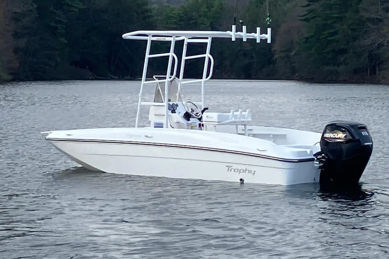 Slide: The Image of Manufacturer Provided Image: Overhead view of 2025 Bayliner Trophy T18 boat on water. - 3