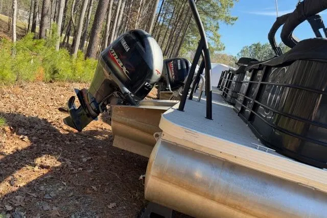 Slide: The Image of 2023 Veranda Vista View 22RC pontoon boat with Yamaha outboard motor in wooded area. - 11