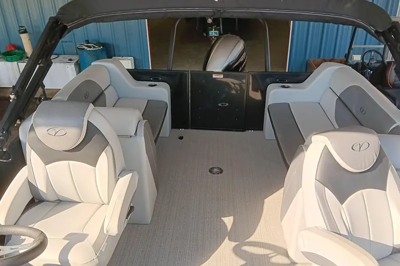 Slide: The Image of 2023 Veranda Vista View 22RC boat interior with plush seating and modern design. - 7