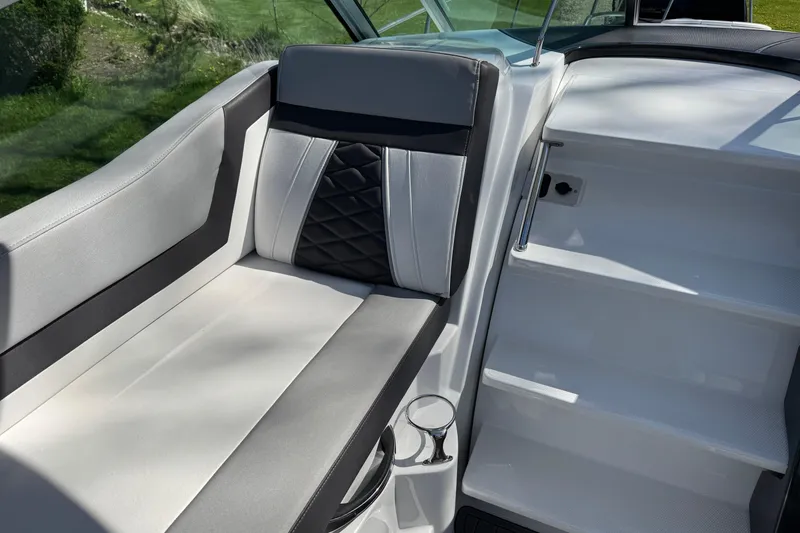 Slide: The Image of 2021 Monterey 295 Sport Yacht interior seating with sleek design and modern upholstery. - 15