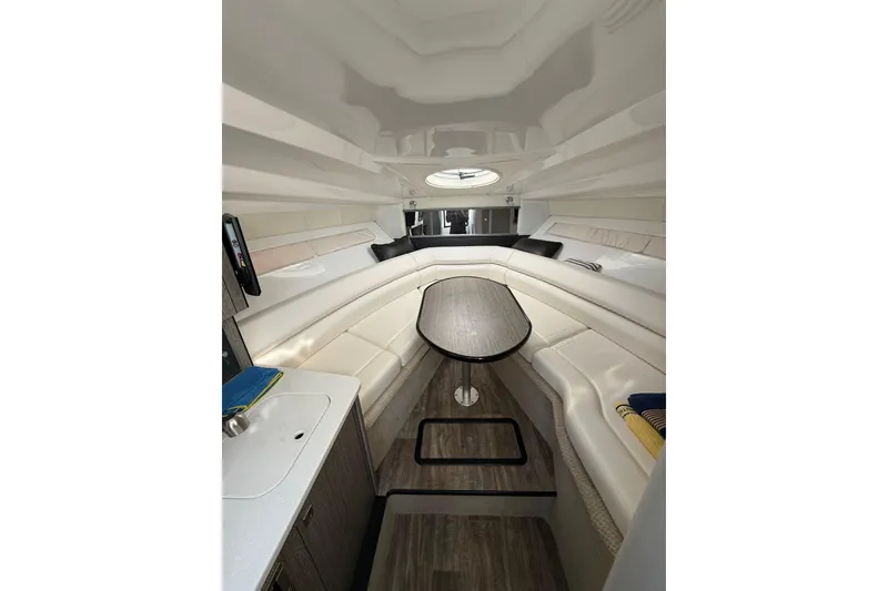 Slide: The Image of Interior of 2021 Monterey 295 Sport Yacht with sleek seating and modern design. - 19