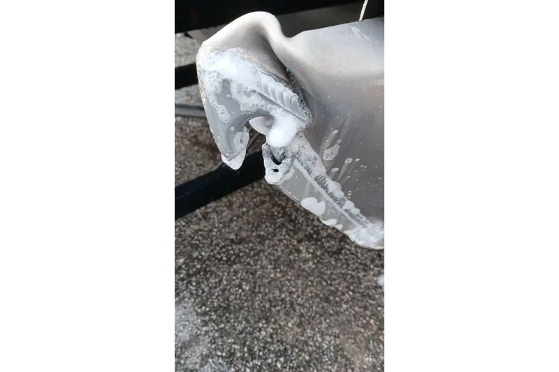 Slide: The Image of Close-up of Veranda Vista View 22RC boat part with soapy water. - 10