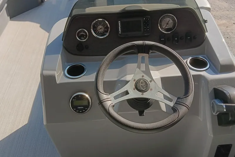 Slide: The Image of 2023 Veranda Vista View 22RC helm with steering wheel and gauges. - 4