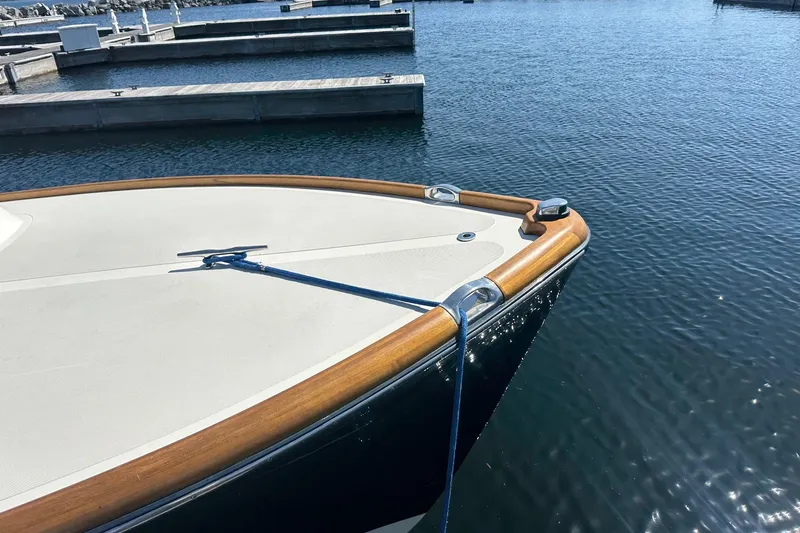 Slide: The Image of Bow of 1996 Hinckley Picnic Boat 36 Classic docked in marina. - 22