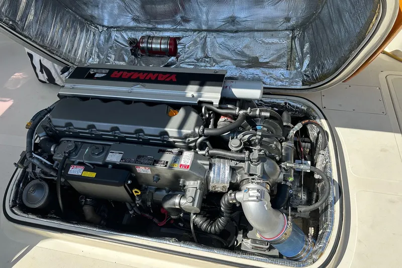 Slide: The Image of Engine compartment of a 1996 Hinckley Picnic Boat 36 Classic with Yanmar engine. - 24