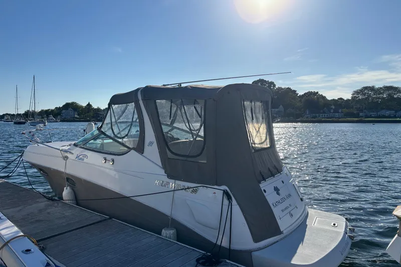 Slide: The Image of 2004 Four Winns 268 Vista boat docked on a sunny day. - 16