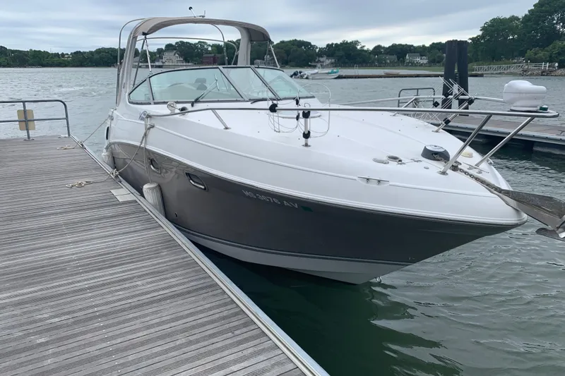 Slide: The Image of 2004 Four Winns 268 Vista boat docked on a calm lake. - 6