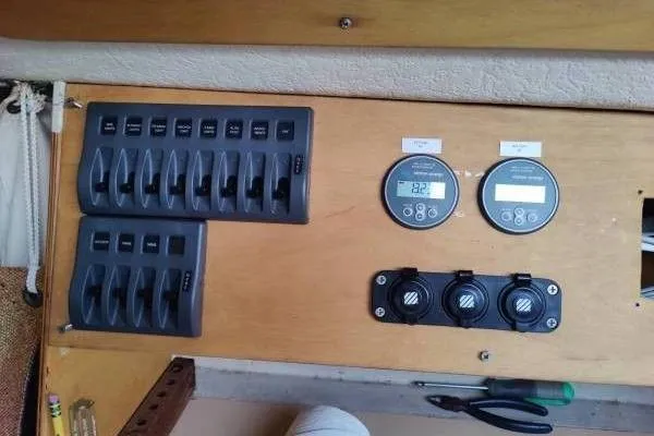 Slide: The Image of Electrical panel of 1983 Cape Bay Fast 40 boat with switches and gauges. - 7