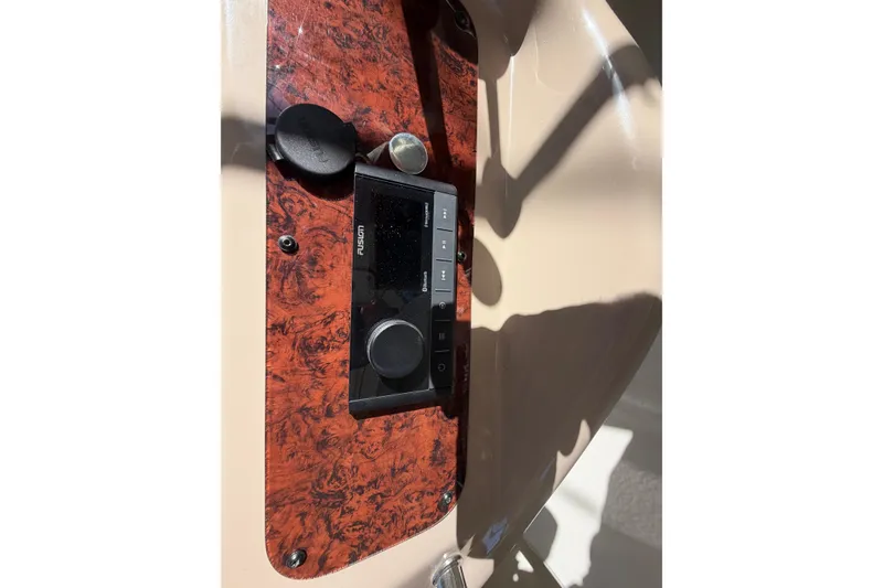 Slide: The Image of Fusion stereo system on 2000 Sea Ray 410 Sundancer boat dashboard. - 24